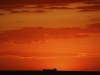 Bateau dans ciel du couchant